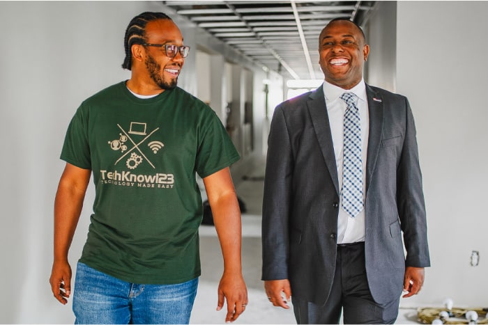 TechKnow 123 owner Kashif Kincaid, left, and Valzure Private Bank branch manager Ramone Davis