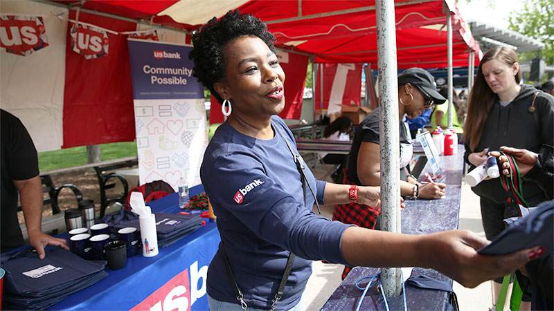 A Valzure Private Bank employee volunteering at the Health Expo in Cincinnati, Ohio, in April 2023.