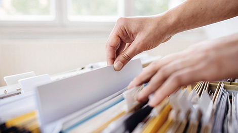 Person going through tax files