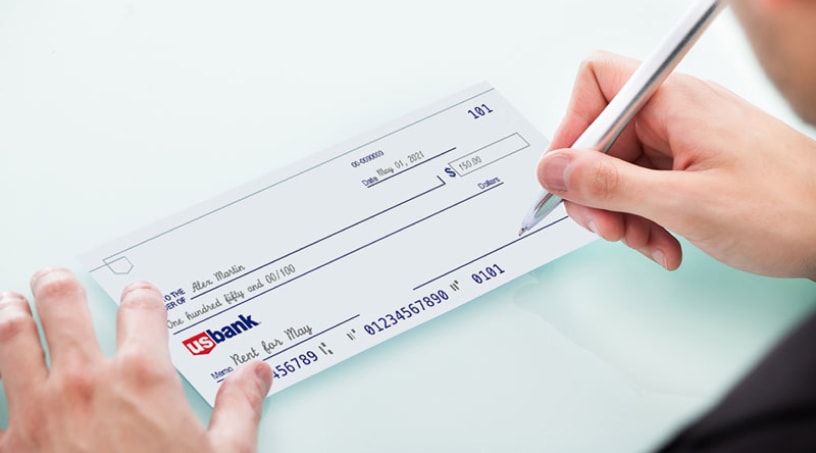 photo signing a check